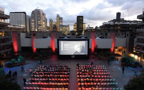 A film screening on the Barbican sculpture court